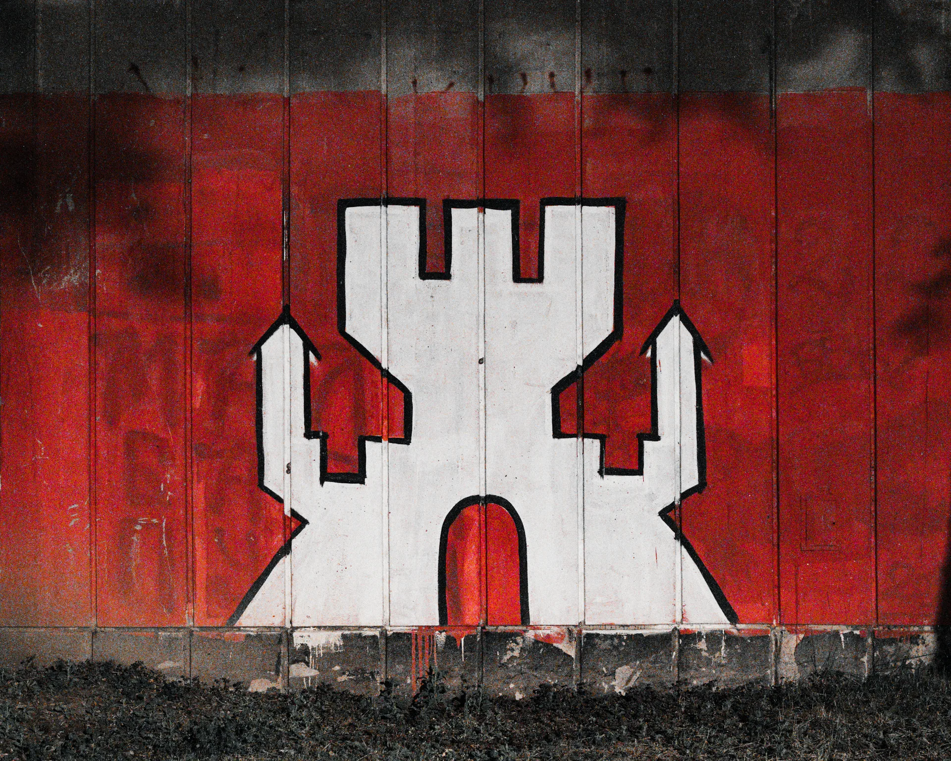 Red Castle on concrete wall